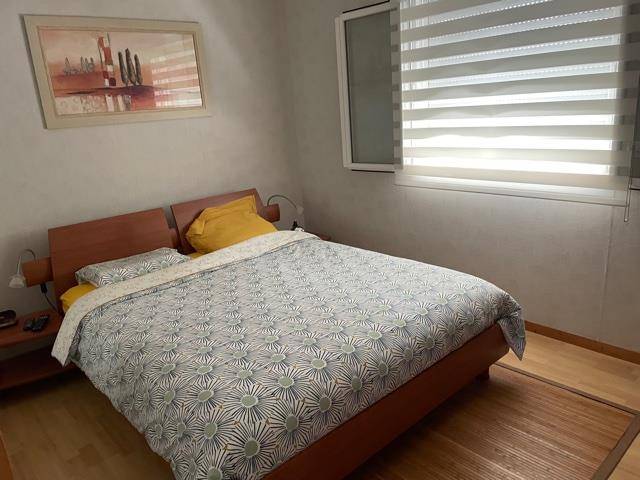 Maison de plain-pied de 150m², 4 chambres, garage sur parcelle de 990m² avec piscine