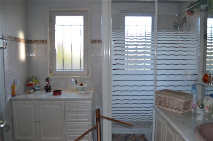 MARCHEPRIME : maison plain-pied 133m², 4 chambres, 2 points d'eau sur parcelle de 785m²