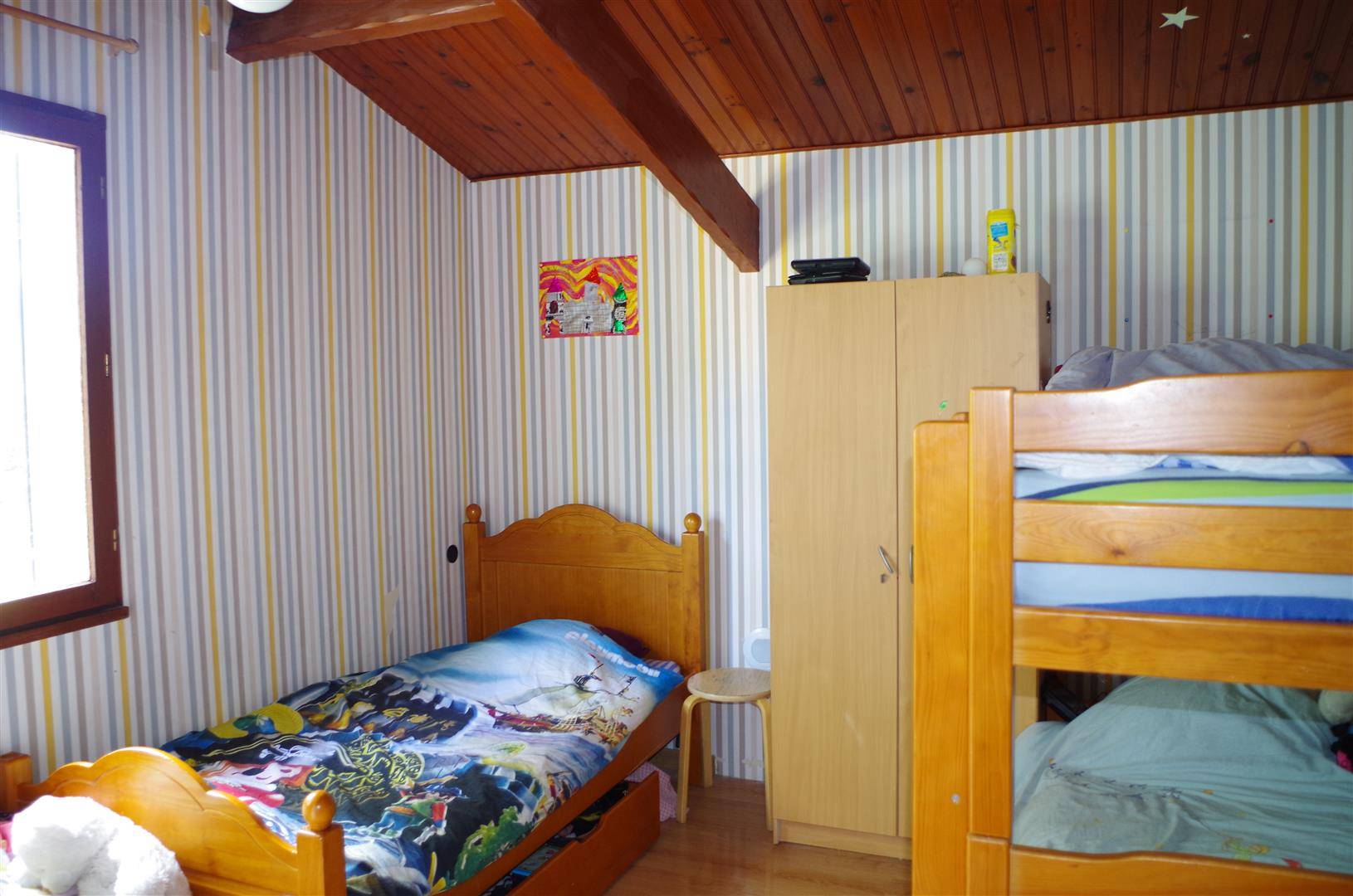 Maison de 128m², 3 chambres, garage sur 1267m² de parcelle sur CESTAS BOURG.