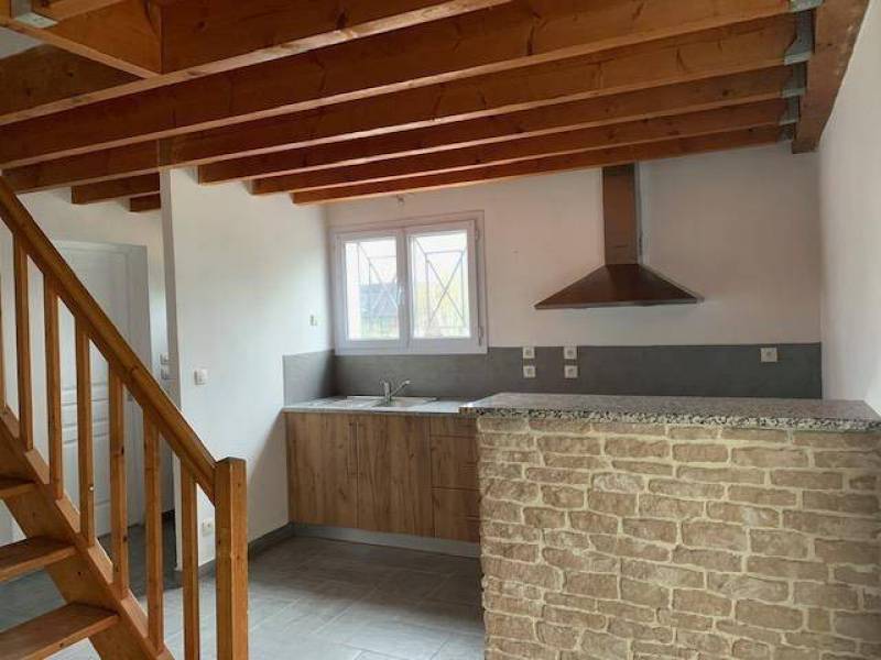 maison d'environ 90m² avec jardin